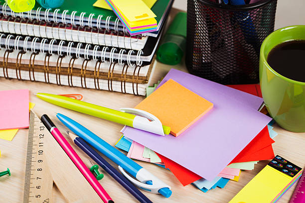 istock School and office accessories on wooden background 484770422