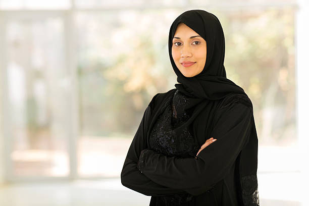 istock middle eastern woman at home 484770776