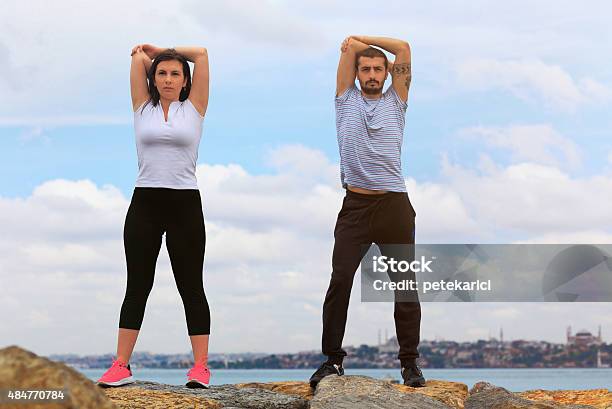 Couple Exercising Near Istanbul Bosphorus Stock Photo - Download Image Now - 20-29 Years, Active Lifestyle, Activity