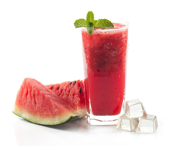 glass of fresh watermelon juice isolated on white glass of fresh watermelon juice isolated on white watermelon juice stock pictures, royalty-free photos & images