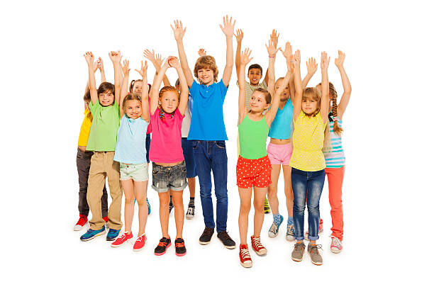 istock Large group of kids rise hands full height shoot 484774370