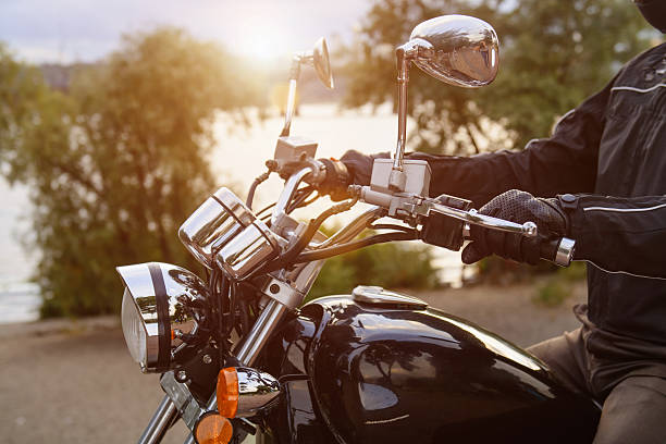 istock Biker riding on motorcycle in the city 484774726