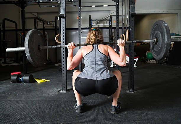 istock Woman Weight Lifting 484774906