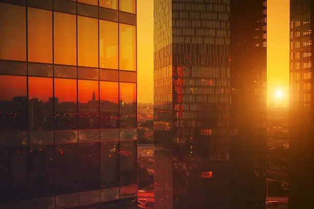 Photo of High modern skyscrapers at sunset