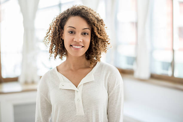 istock African American woman at home 484775508