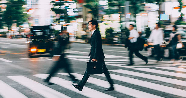 istock Buisnessman crossing the street 484778378