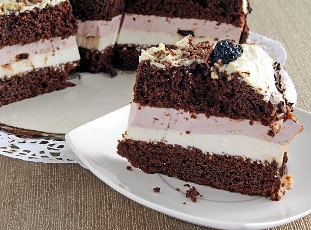 istock tasty chocolate,brown cake with filling and icing 484778422