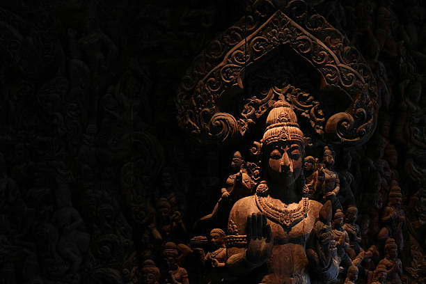 istock Buddha wooden carving. 484780084