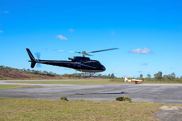 istock Black Helicopter at the Airport 484783510