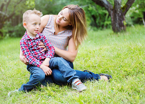 istock Mother and son in forest having fun 484791128