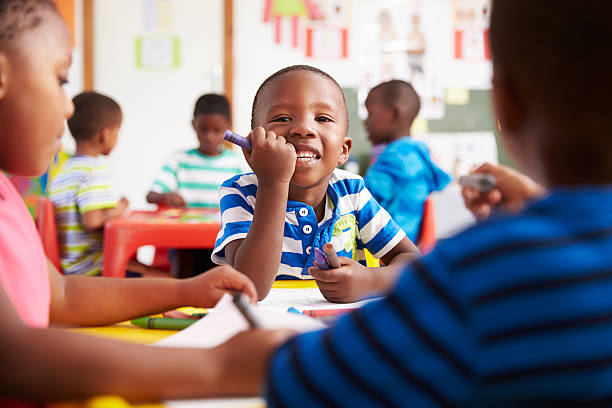 istock Preschool class in South Africa, boy looking to camera 484794624