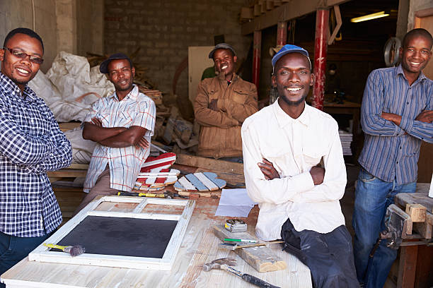 cinco trabalhadores num workshop de carpintaria para construções, retrato, áfrica do sul - south africa waist up indoors image technique imagens e fotografias de stock