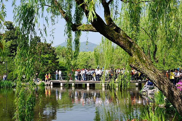 Hangzhou, China - April 25, 2015. Crowds at the Flower Harbor Park, one of the ten most visited park in Hangzhou, China. Hangzhou is the capital city of Zhejiang Province, famous for its beautiful West Lake and historic sites.