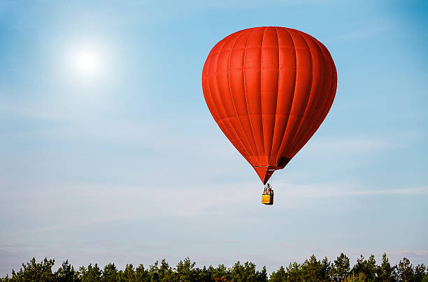 Bright balloon in sunset colorful sky