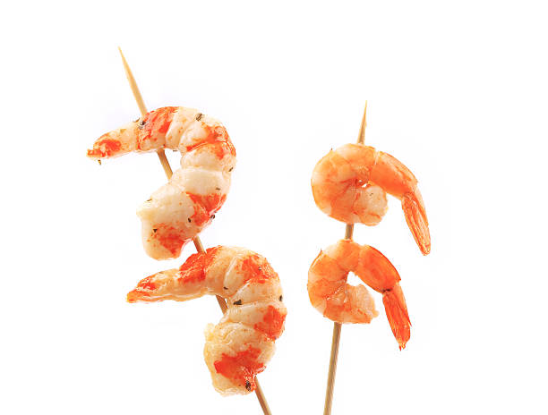 istock Boiled shrimps on skewers. 484810497