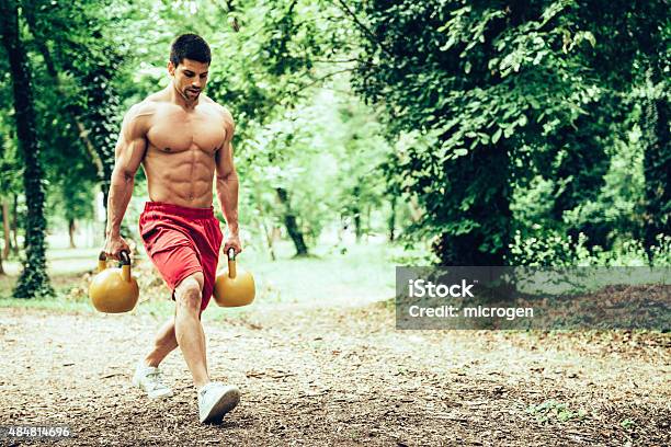Gym Lunges With Kettle Bells Stock Photo - Download Image Now - Kettlebell, Men, Walking