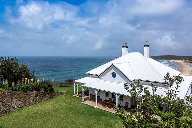 seal rocks lighthouse cottages, australien - national landmark editorial color image horizontal stock-fotos und bilder