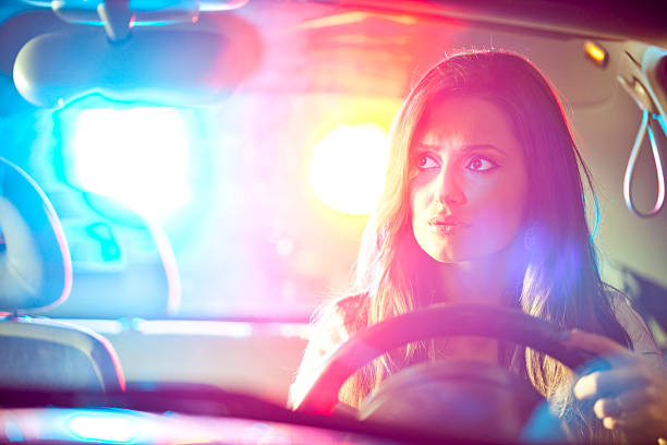 женщина chaced и дорожный контроль - long vehicle flash стоковые фото и изображения