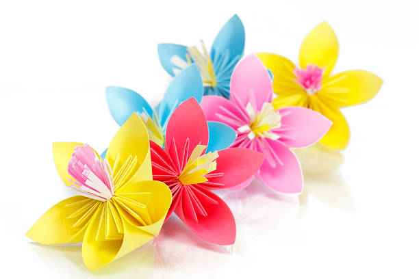 istock Paper colored flowers on a glass 484817505