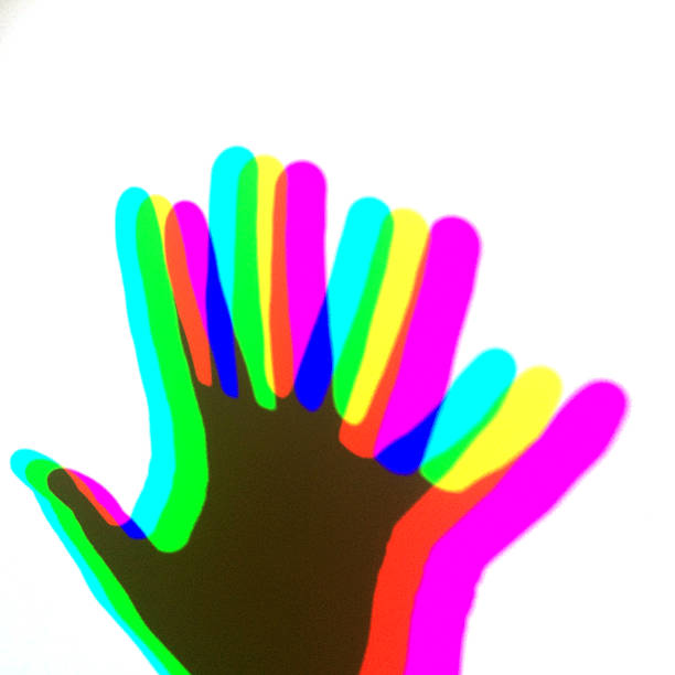 istock Human hand shades on a wall with RGB colours 484818594