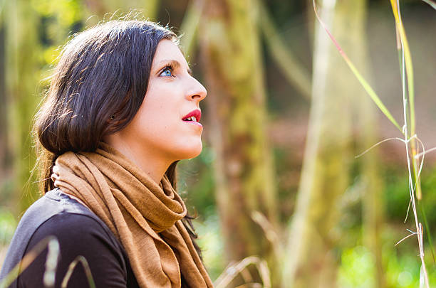 istock young girl side looking surprise copy space autumn 484824600