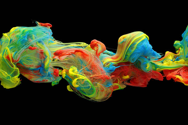 istock Colorful ink and paint swirling through water 484825666