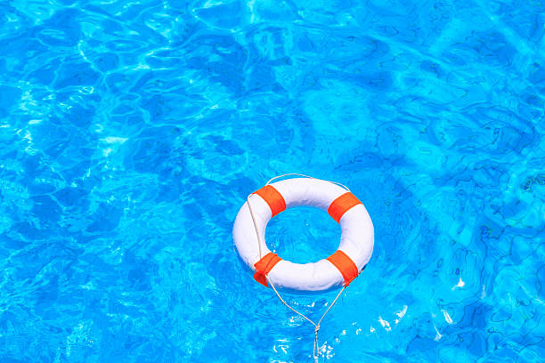 istock Life buoy floating in a swimming pool 484825748