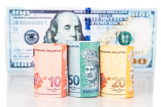 istock Close up of Malaysia Ringgit currency note against US Dollar 484828182