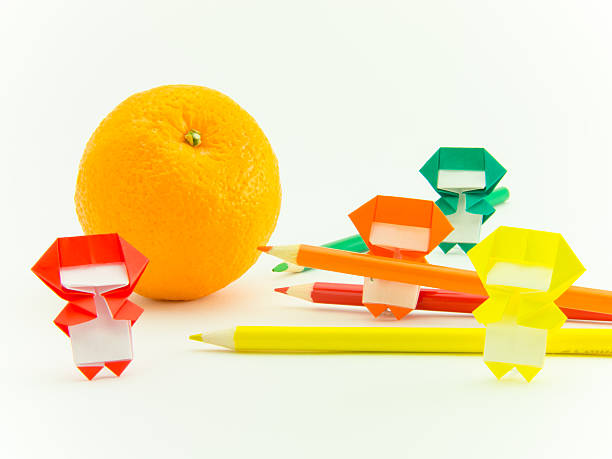 istock Origami Ninja with Orange 484828958