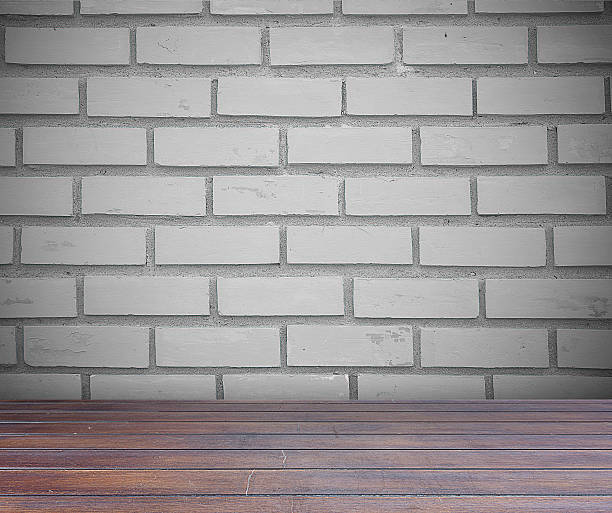 istock Brick wall and brown wood floor with clipping path 484829898