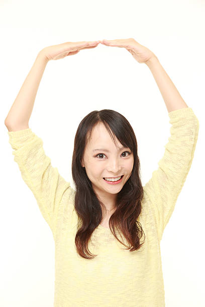 istock Japanese woman showing OK gesture 484830384