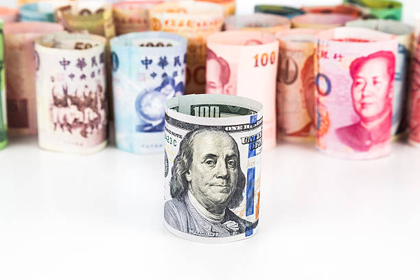 istock Pile of rolled-up currency notes with US Dollar in front 484838172