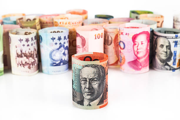 istock Pile of rolled-up currency notes with Australian Dollar in front 484838180