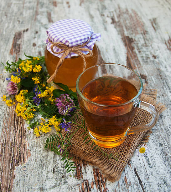 istock Cup of tea, honey and flowers 484838684