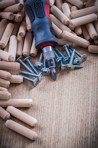 istock Heap of wooden dowels stainless construction nails and insulated 484841380