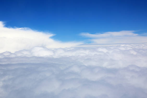 istock Blue sky and Clouds Top view from airplane window 484841912