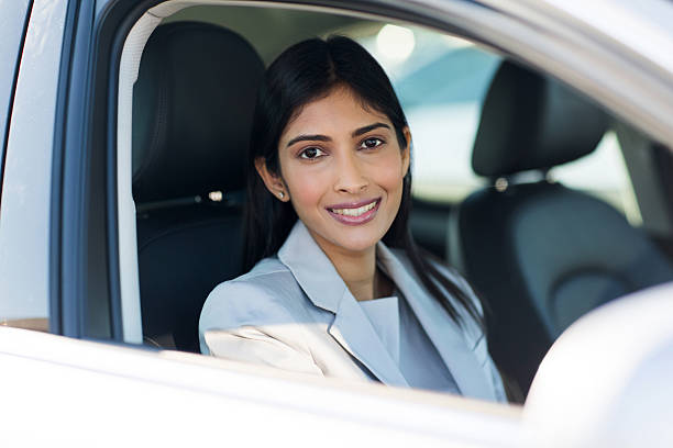 istock indian woman inside a car 484842444