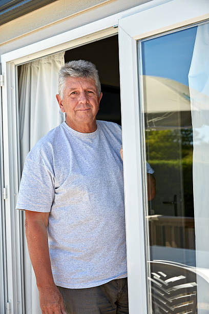 istock Mature man standing in doorway 484843280