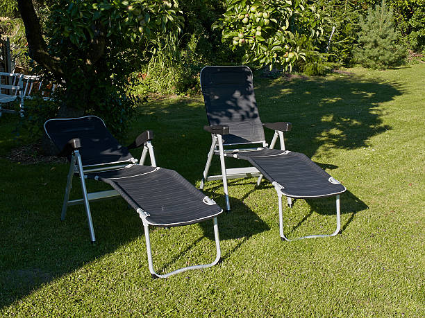 istock Beautiful garden seating for two armchairs 484844024
