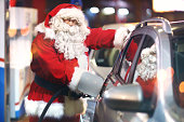 Santa Claus at gas station.