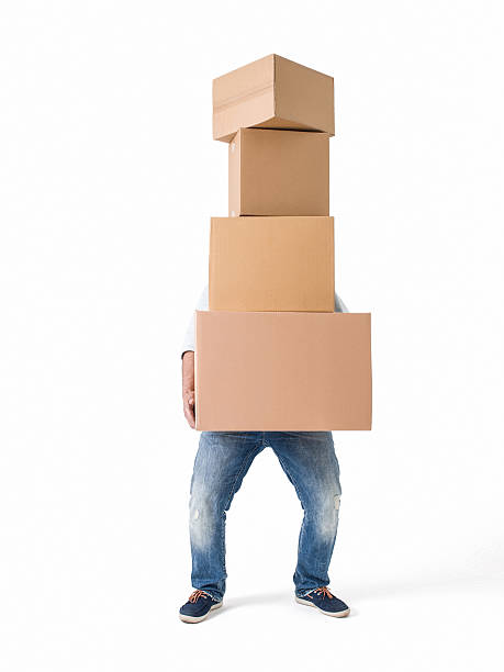 hombre elevación cajas sobre fondo blanco - box men holding isolated fotografías e imágenes de stock