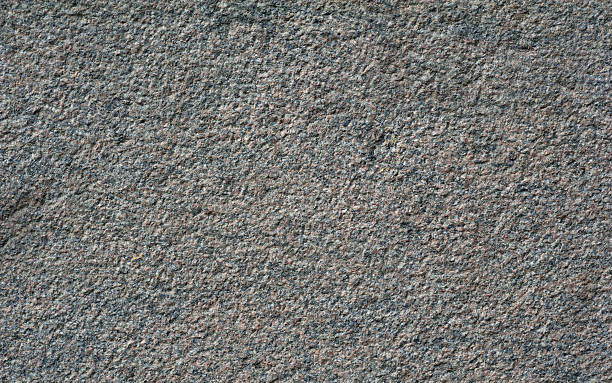 istock Texture of wall of polished pink granite 484845758