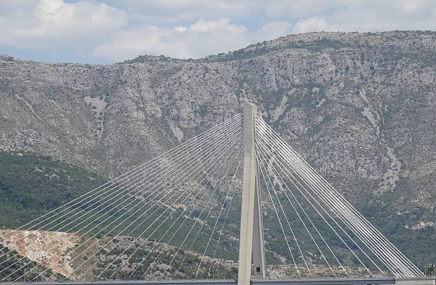 istock Bridge with background of mountains 484845930