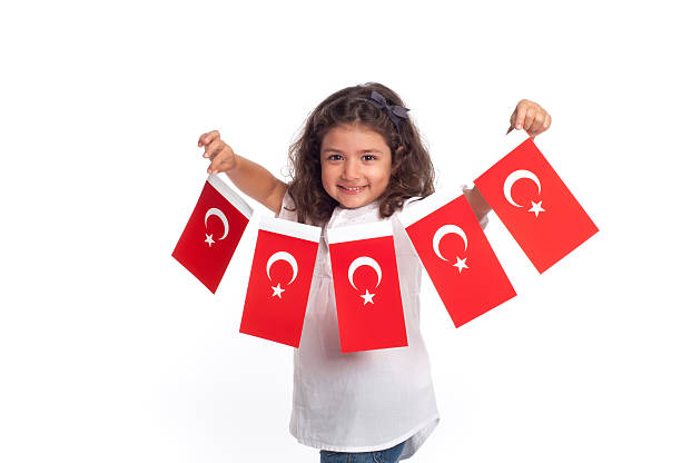 istock Cute girl holding Turkish flag 484849946