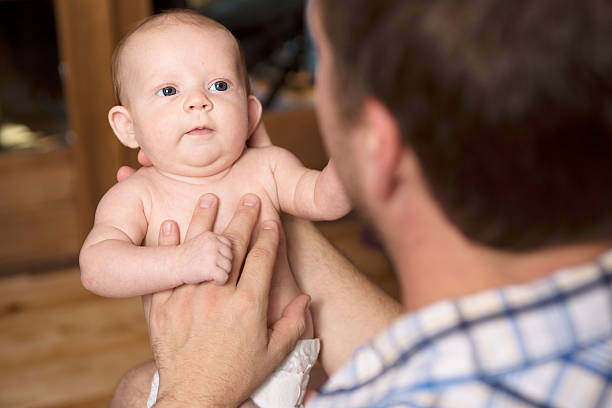istock Father and baby at home together, bedtime 484854746