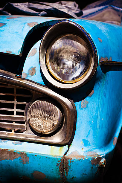 istock Old Blue Vintage Rusty Automobile Headlight Close-Up 484856110