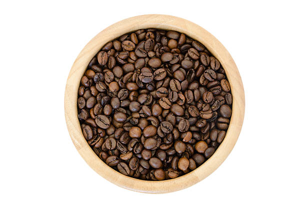 istock coffee beans in a bowl isolated on white background 484856128