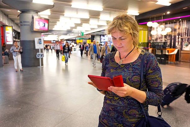 istock Female tourist on train station 484859500