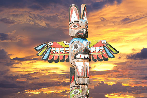 Close up of First Nations totem poles of the Gitxsan natives in Gitanyow or Kitwancool, British Columbia.