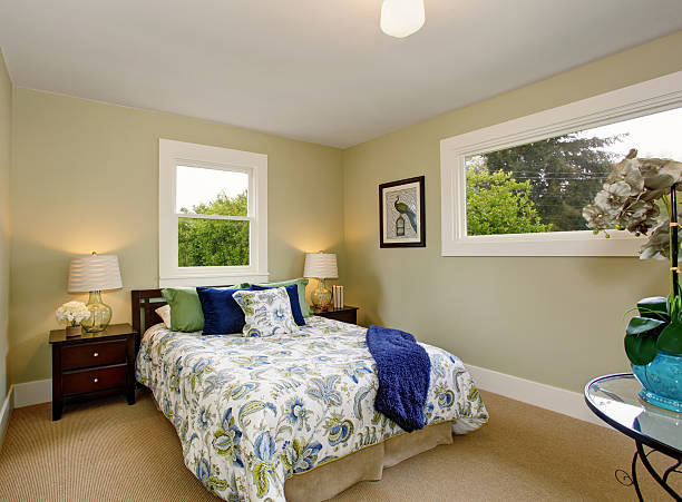 istock Modern bedroom with green and blue interior decor. 484867134